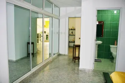 a bathroom with a toilet and a sink at Camu in Camú