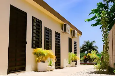 a building with plants on the side of it at Apart Hotel Costa Verde - #2 Exclusivo y Seguro cama King zise in Las Galeras