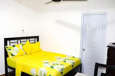 a yellow bed with yellow sheets and yellow pillows at Apart Hotel Costa Verde#4 Exclusivo con cama Queen in Las Galeras