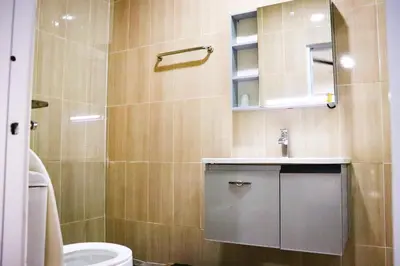 a bathroom with a toilet and a sink and a mirror at Apart Hotel Costa Verde#4 Exclusivo con cama Queen in Las Galeras