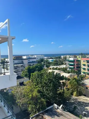 a view of a city from the top of a building at Torre Sophia Monserrat in Los Frailes