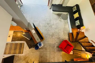 an overhead view of a room with a table and chairs at Private Garden Villa With Parking in Las Terrenas