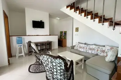 a living room with a couch and a table at La Fenice Beachfront 3 Bedroom With Parking in Las Terrenas