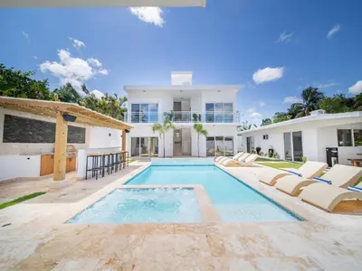 an image of a villa with a swimming pool at Green Palace - 7br Luxury Villa in Sosua 3mins from strip plus 24hr security in Sosúa