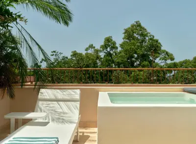 a swimming pool on the balcony of a house at Kimpton Las Mercedes by IHG in Santo Domingo