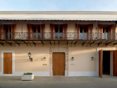 a building with a balcony on top of it at Kimpton Las Mercedes by IHG in Santo Domingo