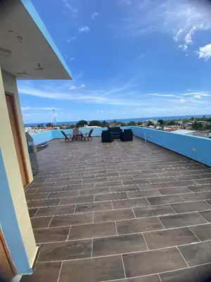 a view of a patio from the roof of a house at Estefany Aparment New in San Felipe de Puerto Plata