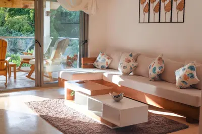 a living room with a couch and a coffee table at Villa loren A3 in Las Terrenas