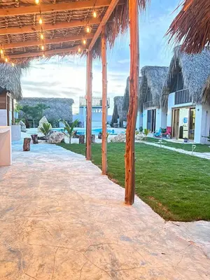 a pavilion with a view of a resort at Blue Beach Eco-Hotel by Sanfabini in Bayahibe