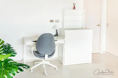 an office with a white desk and a gray chair at Syrma 302 Estrella Dominicus Apartment in La Laguna
