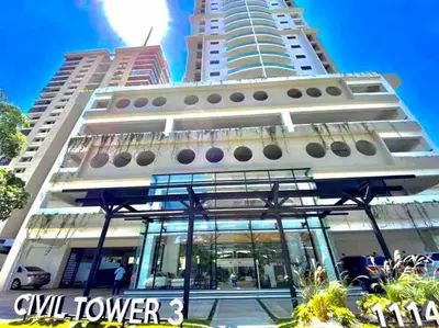 a large white building with two tall buildings at Brand New Luxury 1 BDR Pool-Cine - Saune-WIFI - I 19 in Santo Domingo