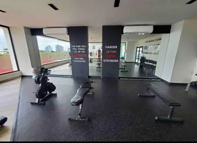 a gym with pilates equipment in a building at Deluxe_Suite_1BDR_POOL_GYM_SAUNE in Santo Domingo