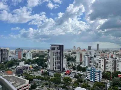 a view of a city with tall buildings at RoyalSuite 1BDR-Poll-Gym-Saune-g17 in Santo Domingo