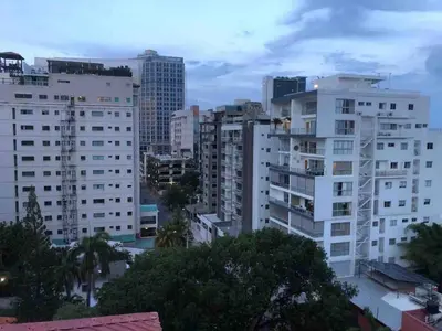a view of a city with tall buildings at Modern Centrical Evaristo Apartment With Tub in Los Prados