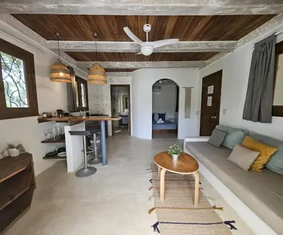 a living room with a couch and a ceiling fan at Soul Dream Bonita in Las Terrenas