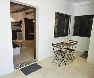 a dining room with a table and chairs in a room at Soul Dream Bonita in Las Terrenas