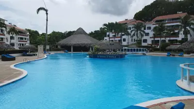 a large blue swimming pool at a resort at Aparta Hotel Monte Vista Sosua in Sosúa