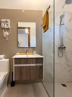 a bathroom with a sink and a shower at Cozy Apartment in Las Galeras in Las Galeras