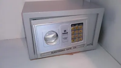 a small microwave oven sitting on a wall at apart Jacaranda Bayahibe in Bayahibe