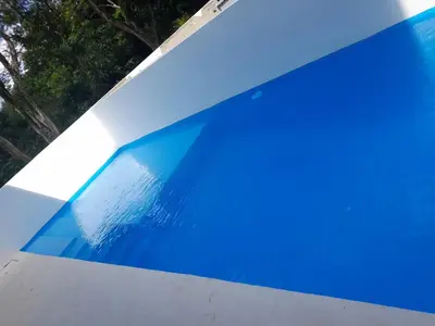a close up of the side of a blue object at Ocean Bliss in Sosúa