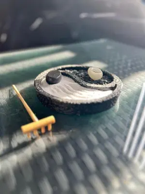 a close up of a cell phone sitting on a table at Level suites VIP in Sosúa