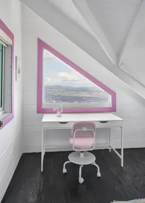 a desk and a chair in a room with a window at New-CasitaDeLasFlores-View-Wifi-Jacuzzi-Jarabacoa in Jarabacoa