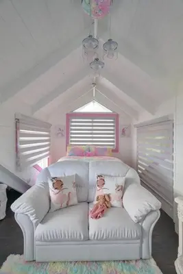 a living room with a white couch with dolls on it at New-CasitaDeLasFlores-View-Wifi-Jacuzzi-Jarabacoa in Jarabacoa