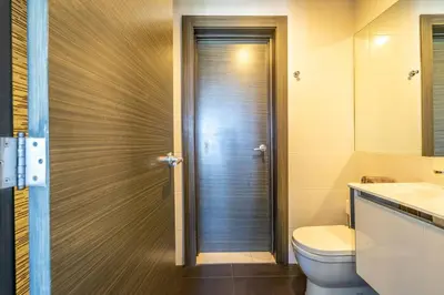 a bathroom with a shower with a toilet and a sink at Dream Rooftop Downtown View in Santo Domingo