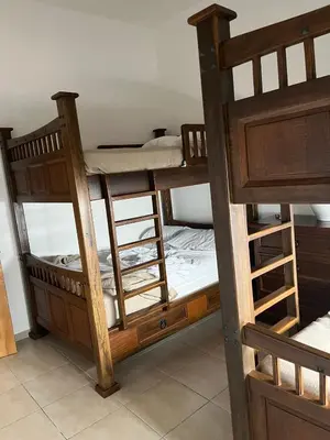 a couple of bunk beds in a room at Bayahibe Cadaques Caribe Apartment in Bayahibe