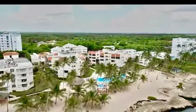 an aerial view of a resort on the beach at Apartamento l Vista al Mar Albatros BY JU Juan Dolio in Juan Dolio