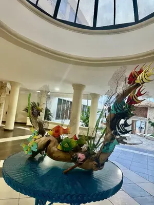 a sculpture of a deer on a table in a building at Apartamento l Vista al Mar Albatros BY JU Juan Dolio in Juan Dolio