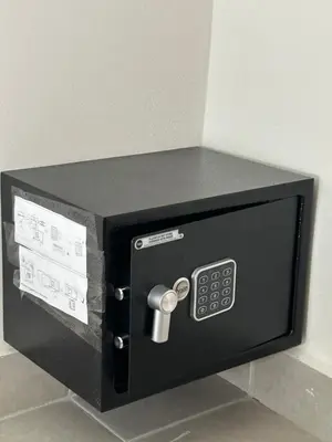 a black microwave oven with a remote control at Villa Antonia Spectacular Private Stay with Pool, Just Steps from the Beach, Housekeeping & Kitchen in Exclusive Gated Community in Las Terrenas