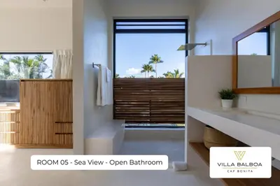 a bathroom with a sink and a mirror at Villa BALBOA - Las Terrenas - Punta Bonita in Las Terrenas