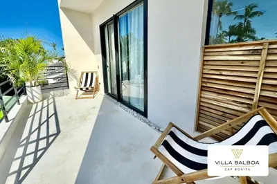 a balcony of a villa with a view of the ocean at Villa BALBOA - Las Terrenas - Punta Bonita in Las Terrenas
