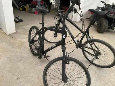 a black bike is parked in a garage at Level suites Penthouse in Sosúa