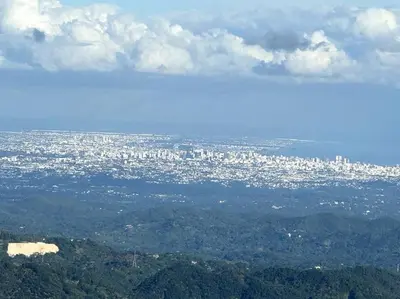 a view of a city from the top of a mountain at DiNancyCasolare - La Colonia, SC in Cambita Garabitos
