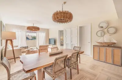 a dining room with a table and chairs at Exceptional apartment nearby beach at Portillo in Las Terrenas