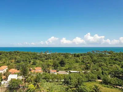 an aerial view of a resort and the ocean at Encuentro Studio surf kitesurf Residencia Aris in Cabarete