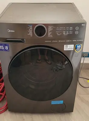 a microwave oven with a person standing inside of it at Departamento Sol in Santo Domingo