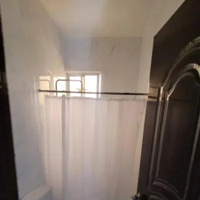 a window in a room with a white curtain at Departamento Estrella en Santo Domingo in Santo Domingo