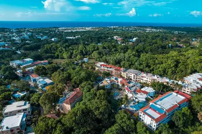 an aerial view of a resort in the forest at Villa Campo Sosúa - Apartamento in Sosúa