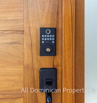 a close up of a wooden door with a lock at Villas Santa Fe in Sosúa
