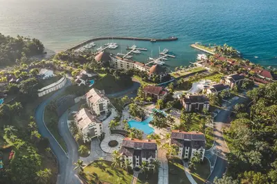 an aerial view of a resort next to the ocean at Magnificent villa with ocean view in Puerto Bahia in Sabana