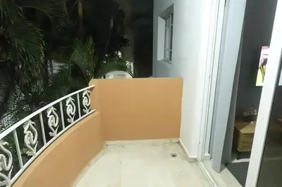 a stairway leading to a room with a balcony at Juan Dolio,Beach, Pool, 40