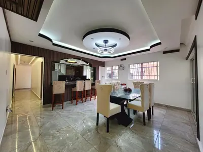 a dining room with a table and chairs at Aparta hoteles Corales del Sur in La Viva