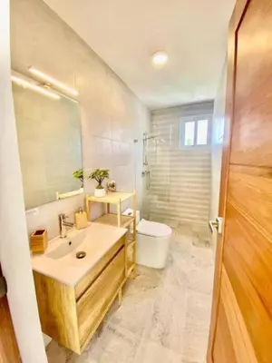 a bathroom with a sink and a toilet at Estrella del caribe in La Laguna