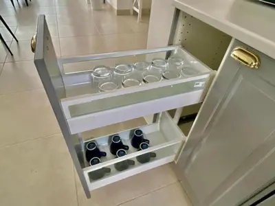 an open refrigerator with bottles of wine in it at apartamento luxury in La Laguna