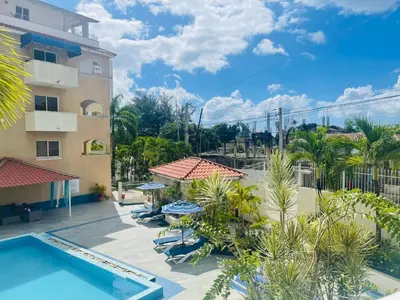 an aerial view of a resort with a swimming pool at Apartamento en la playa 1A - Residencial Marina Bay in Cuevas