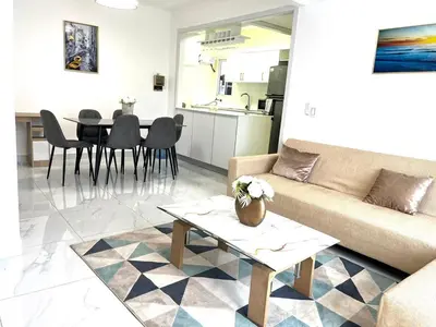 a living room with a couch and a table at Hidden Paradise in La Grúa