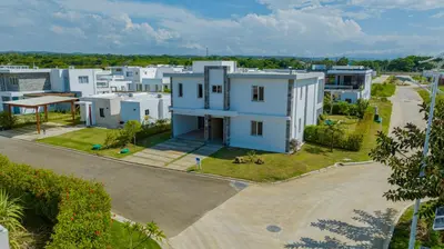 an aerial view of a large white house at Villa Chocolate in Laguna del Higüero